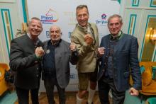 Foto: Von links nach rechts - Frank Schneppendahl, Leiter des Private-Advisory-Teams von Hauck Aufhäuser Lampe, Dr. Axel Munz von Angermaier Trachten, Olympia-Legende Lars Riedel und Veranstalter Jürgen Blum - Fotograf: Robert Gongoll