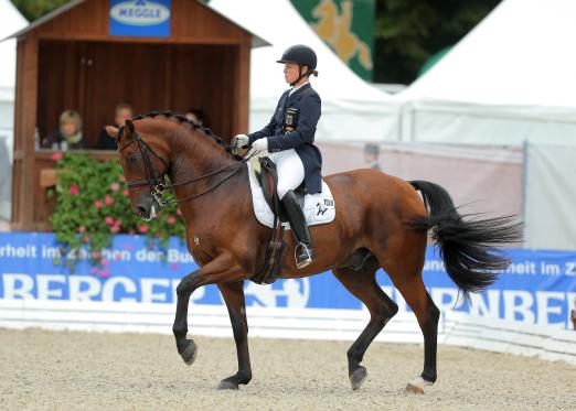 Foto: Isabell Werth mit Don Johnson im Grand Prix Special in Donaueschingen - Fotograf: Stefan Lafrentz 