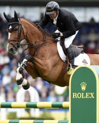 Foto: Eric Lamaze and “Fine Lady”, winners of the “Turkish Airlines-Prize of Europe”, the first qualifier for the “Rolex Grand Prix” of the CHIO Aachen 2016 - Fotograf: Rolex Grand Slam of Show Jumping/Kit Houghton