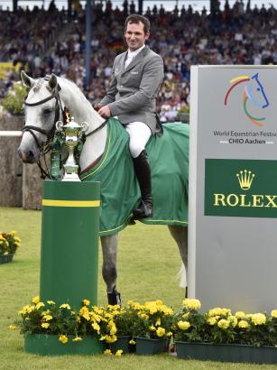 Foto: Philipp Weishaupt and "LB Convall", winners of the "Rolex Grand Prix" of the CHIO Aachen 2016 - Fotograf: Rolex Grand Slam of Show Jumping/Kit Houghton