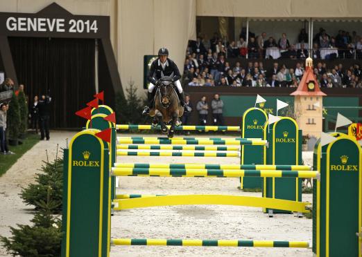 Foto: Steve Guerdat, local hero of the CHI Geneva and winner of the “Rolex Grand Prix” 2013 - Fotograf: Rolex Grand Slam of Show Jumping/Kit Houghton