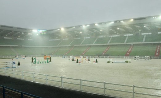 Torrential rain during this afternoon’s final Jumping test event before the Alltech FEI World Equestrian Games™ 2014 get underway on 23 August, gave organisers and athletes the best possible opportunity to see how the footing in both the competition and training arenas at d’Ornano Stadium in Caen (FRA) would perform in tough conditions. (FEI/PSV J. Morel)