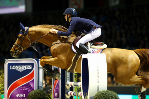 Ireland’s Bertram Allen clinched his second victory in the Longines FEI World Cup™ Jumping 2014/2015 Western European League at Bordeaux, France tonight riding Romanov. (FEI/Pierre Costabadie) 