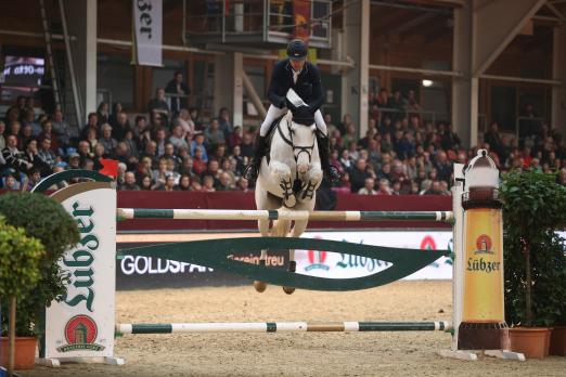 Foto: Mannschafts-Weltmeister Carsten-Otto Nagel mit Corradina im Großen Preis von Lübzer in Neustadt-Dosse - Fotograf: Stefan Lafrentz 