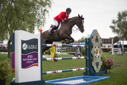 Foto: The Swiss team of Pius Schwizer, Romain Duguet, Paul Estermann and Steve Guerdat won the opening leg of the Furusiyya FEI Nations Cup™ Jumping Europe Division 1 series at Lummen, Belgium today without Olympic champion, Guerdat, having to jump a single fence. Pictured are Romain Duguet and Quorida de Treho who produced one of the three double-clear performances that clinched it for the Swiss side. - Fotograf: FEI/Dirk Caremans