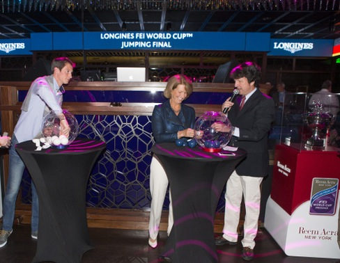 Conducting the draw for tomorrow’s opening competition of the Longines FEI World Cup™ Jumping 2015 Final at the Hakkasan nightclub at the MGM hotel in Las Vegas: (L to R) defending champion Germany’s Daniel Deusser, 2012 champion America’s Beezie Madden and commentator Peter Doubleday. (FEI/Dirk Caremans) 