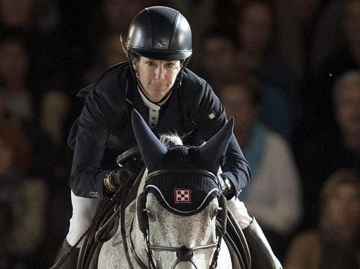 Foto: Laura Kraut setzte sich im Springen der Global Champions Tour in Lausanne durch. - Fotograf: Jean-Christophe Bott - dpa