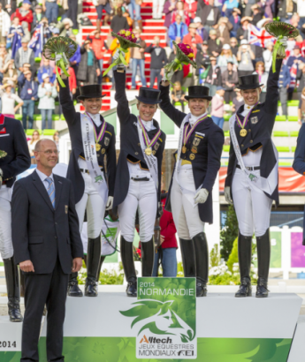 Germany clinched the Dressage team title at the Alltech FEI World Equestrian Games™ in Normandy, France today. L to R: Chef d’Equipe Klaus Roeser, Kristina Sprehe, Helen Langehanenberg, Isabell Werth and Fabienne Lutkemeier. (Dirk Caremans/FEI) 