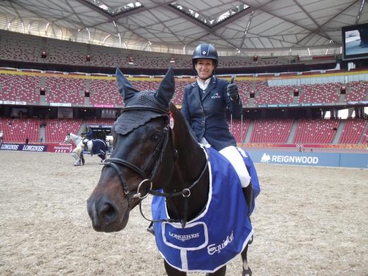 Foto: Siegerin, der Longines Beijing Masters 2013, Laura Kraut - Fotograf: Longines Beijing Equestrian Masters