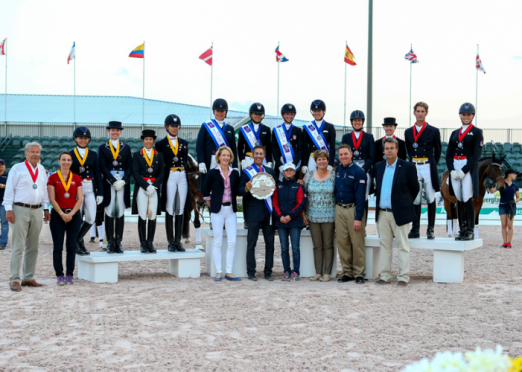 (L to R) Team Canada 2, Jill Irving, Tina Irwin, Christilot Boylen and Shannon Dueck; Team USA 1, Kimberly Herslow, Allison Brock, Laura Graves and Olivia LaGoy-Weltz; and Team Canada 1, Diane Creech, Belinda Trussell, Chris Von Martels and Megan Lane. Foreground: Arlene Page, Robert Dover, Debbie MacDonald, Diane Sasser, Allyn Mann and Thomas Bauer. (FEI/Susan Stickle) 