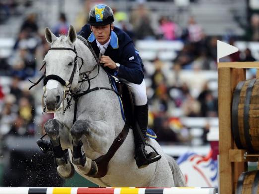 Foto: Peder Fredricson blieb mit seinem Pferd Cash auch im Stechen fehlerfrei - Fotograf: Larry W. Smith - dpa