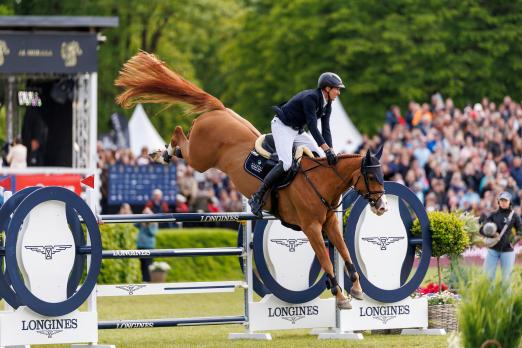 Foto: Andre Thieme und Cahkaria gewinnen den Longines Grand Prix of Hamburg Al Shira'aa CSI5* Tour - Fotograf: sportfotos-lafrentz.de
