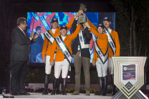 The Netherlands’ team celebrate victory in the Furusiyya FEI Nations Cup™ Jumping 2014 Final in Barcelona, Spain tonight. (L to R), HRH Prince Faisal of Saudi Arabia and Dutch team members Jeroen Dubbeldam, Gerco Schroder, Chef d’Equipe Rob Ehrens, Maikel van der Vleuten and Jur Vrieling. (FEI/Dirk Caremans) 