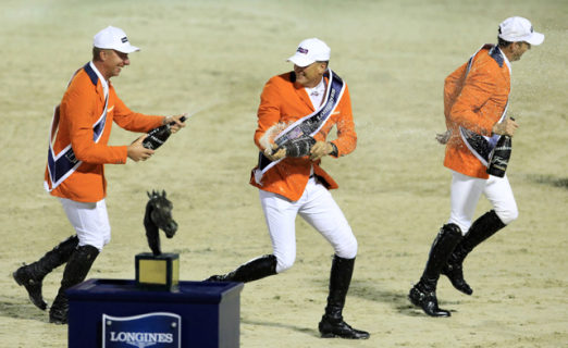 Champagne celebration time for Team Netherlands after winning the Longines FEI Jumping Nations Cup™ Final at the Real Club de Polo in Barcelona (ESP) last September. (FEI/Jim Hollander) 