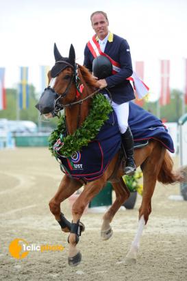 Foto: Rene Tebbel kürte sich heute zum herausragenden CSI3* Magna Racino Grand Prix Sieger im Weltranglistenspringen der Diamond Tour über 1,55 m - Fotograf: 1clicphoto Hervè Bonnaud