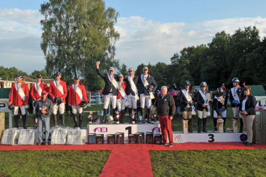On the winner’s podium at the FEI European Jumping Championships for Veterans 2014 at Hoogboom-Kapellen in Belgium - (L to R) Team Germany (silver), Team Belgium (gold) and Team Great Britain (bronze). (www.fotoagentur-Dill.de/FEI)