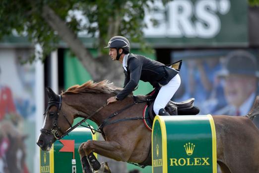 Foto: Steve Guerdat and "Albführen's Happiness", winners of the first qualifier for the "CP 'International', presented by Rolex" - Fotograf: Rolex Grand Slam of Show Jumping/Kit Houghton