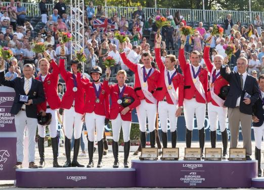 Foto: Einmal Gold, zweimal Silber - der Belgier Pieter Devos und die beiden Deutschen Christian Ahlmann und Daniel Deusser setzen auf Pferde - Fotograf: Worldofshowjumping