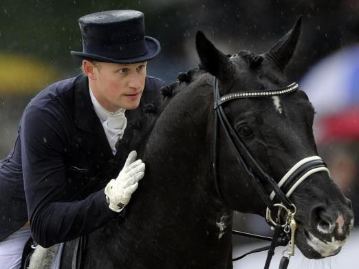 Foto: Matthias Rath peilt nun mit Totilas die Teilnahme an den Olympischen Spielen 2016 an. - Fotograf: Marius Becker - dpa