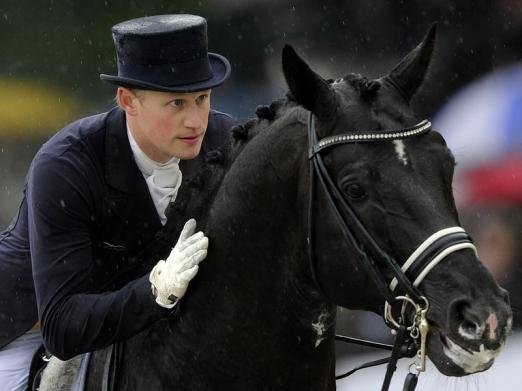 Foto: Dressurreiter Matthias Rath und sein Pferd Totilas - Fotograf: Marius Becker - dpa