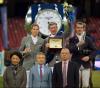 Foto: The prize-giving ceremony of the Longines Grand Prix with Henrik von Eckermann, Ludger Beerbaum and Gregory Wathelet on the podium and Jing Li, CEO of Dashing Equestrian, Dennis Li, vice-president of Longines China, and Li Nianxi, chief secretary of the Chinese Equestrian Association, in the front. - Fotograf: Longines Equestrian Beijing Masters/Arnd Bronkhorst