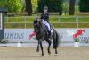 Foto: Birkhof´s Fair Game und Pia Casper siegen in der zweiten Wertung für Junge Reiter - Fotograf: Equitaris