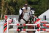 Foto:Österreichs Überfliegerin Stefanie Bistan mit ihrer Schimmelstute Juvina - Fotograf: Manfred Leitgeb
