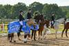 Foto: Siegerinnen in der Dressur des Kuschel Cups - Lara Eickmann mit Beach Boy und Lotta Sassermann mit Cassanjo belegten die Plätze eins und zwei und qualifizierten sich so für das Finale im Herbst. Lotta Sassermann siegte zudem im Springen und löste so ebenfalls das Ticket für den Saisonabschluss - Fotograf: RathmannVerlag/Ken-Christian Horst