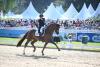 Foto: Lisa Müller vor voller Kulisse in der von ihr und ihrem Mann Thomas gesponserten Gut Wettlkams Dressurarena bei Pferd International München 2024 -Fotograf: Hubert Fischer