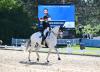 Foto: Charlott-Maria Schürmann gewinnt am Abend das beliebte Dressurderby - den Preis der Freunde Pferd International München 2024 mit dem Schimmel Heldgaard's Accoya - Fotograf: Hubert Fischer