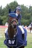 Foto: In der Stilspringprüfung der Klasse L setzte sich Elsa Thiesen vom Fehmarnschen Ringreiterverein mit ihrem westfälischen Wallach Spartacus an die Spitze - Fotograf: Photo Rocket