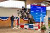 Foto: Chavaros II von Charleston-Con Air durfte mit Claudia Wähling einige wenige Sprünge machen. Links im Bild Zuchtberater Tjark Roll, der den Reservesieger 2021 auch auf die Körung vorbereitet hat - Fotograf: EQUITARIS/ Becker