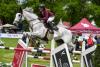 Foto: Dominique Weber mit Chasseur en blanc siegte im CSI2* bei der Pferd International München 2021 - Fotograf: Ursula Puschak 