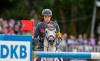 Foto: Hochkonzentriertes Paar als damals noch Führende bei der DKB-Riders Tour in Münster: Denis Nielsen und DSP Cashmoaker, die jetzt in München um den Platz auf dem Podium kämpfen - Fotograf: Stefan Lafrentz